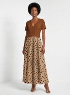 "Kahawa" Short Sleeve Maxi Dress — three-quarter view on model
