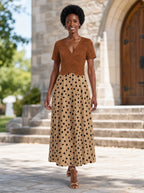 "Kahawa" Short Sleeve Maxi Dress — front view on model in the churchyard