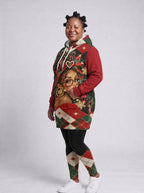 "Kipenzi" Christmas Hoodie Dress — three-quarter view on model, hand in pocket, styled with the matching leggings