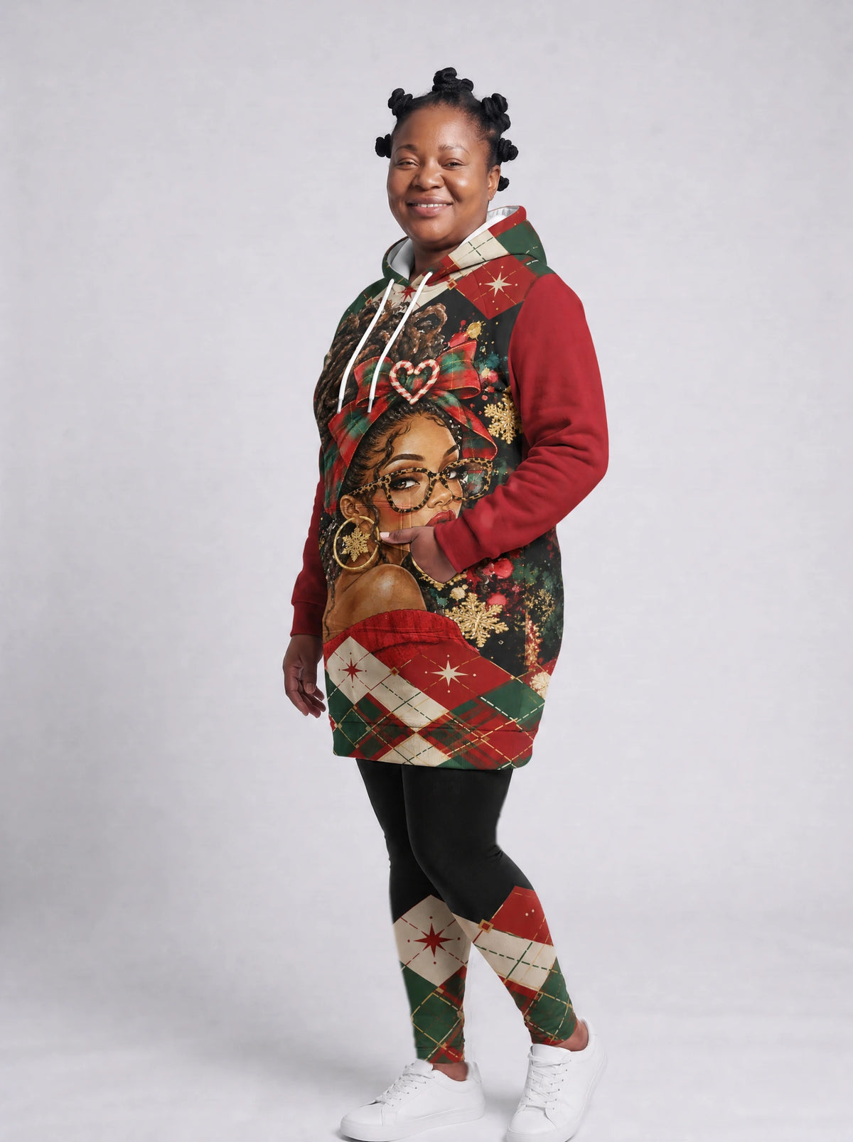 "Kipenzi" Christmas Hoodie Dress — three-quarter view on model, hand in pocket, styled with the matching leggings