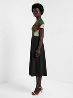 "Kipenzi" Christmas Sweetheart Midi Dress — side view on model