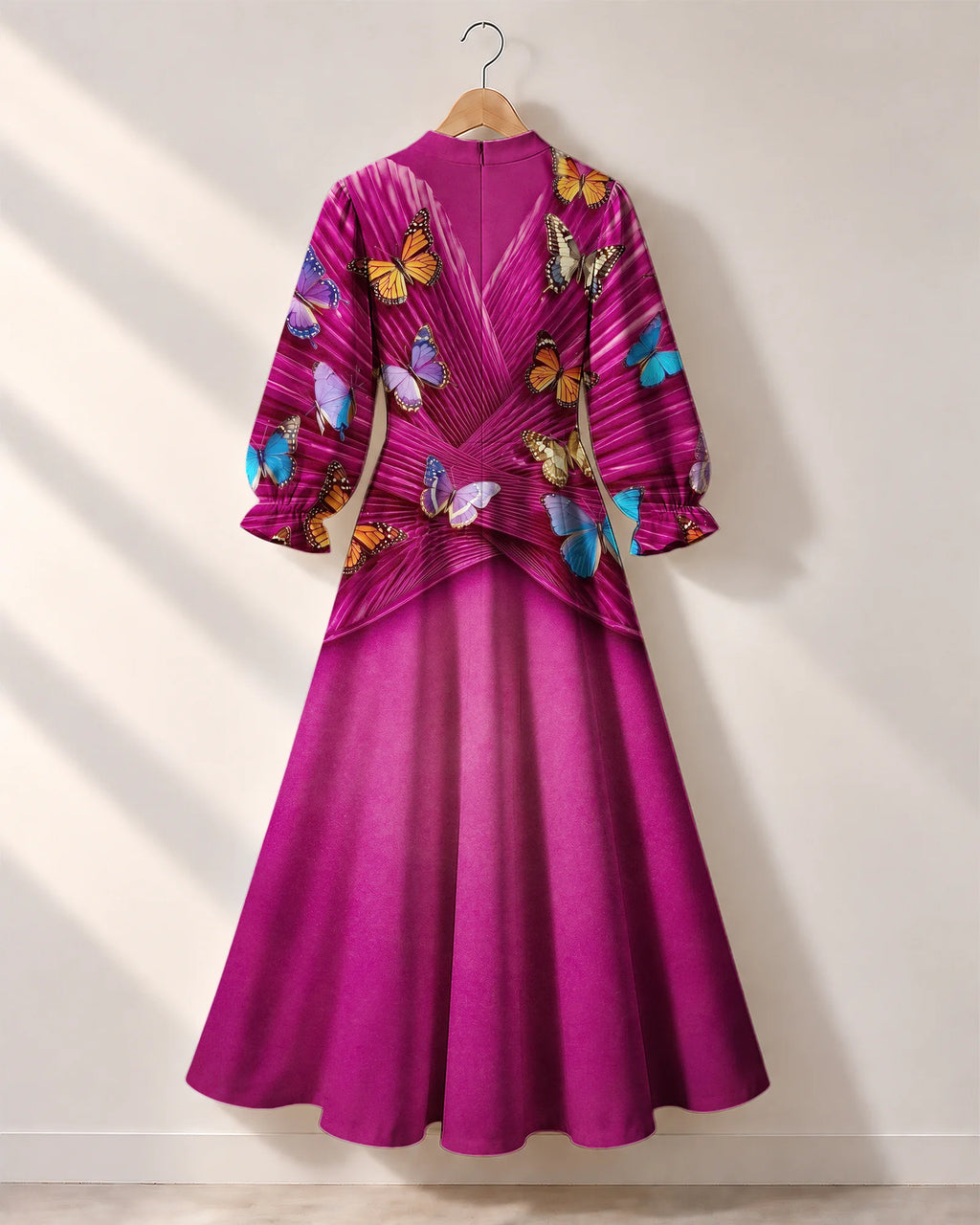 "Kipepeo" Long Puff Sleeve Dress — the dress on a hanger, back