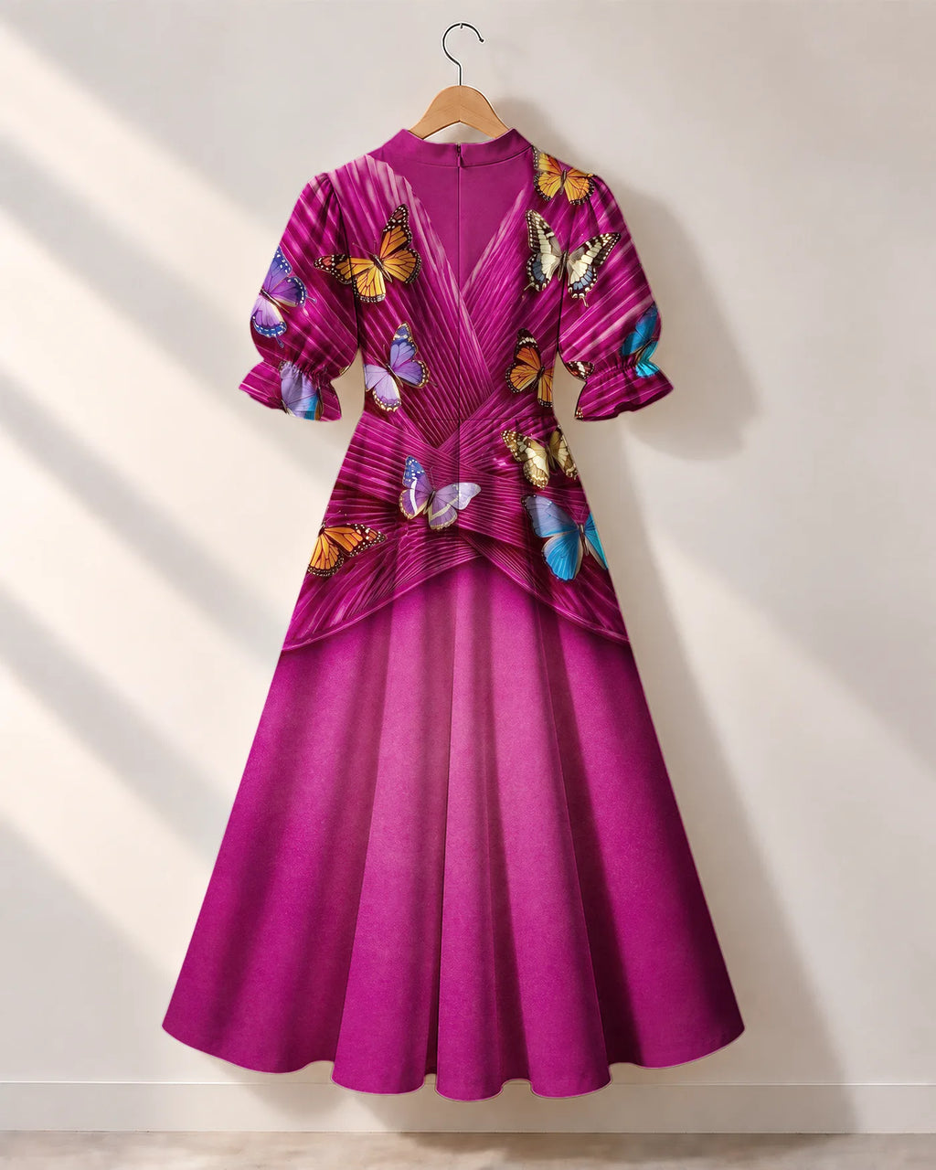 "Kipepeo" Puff Sleeve Dress — the dress on a hanger, back