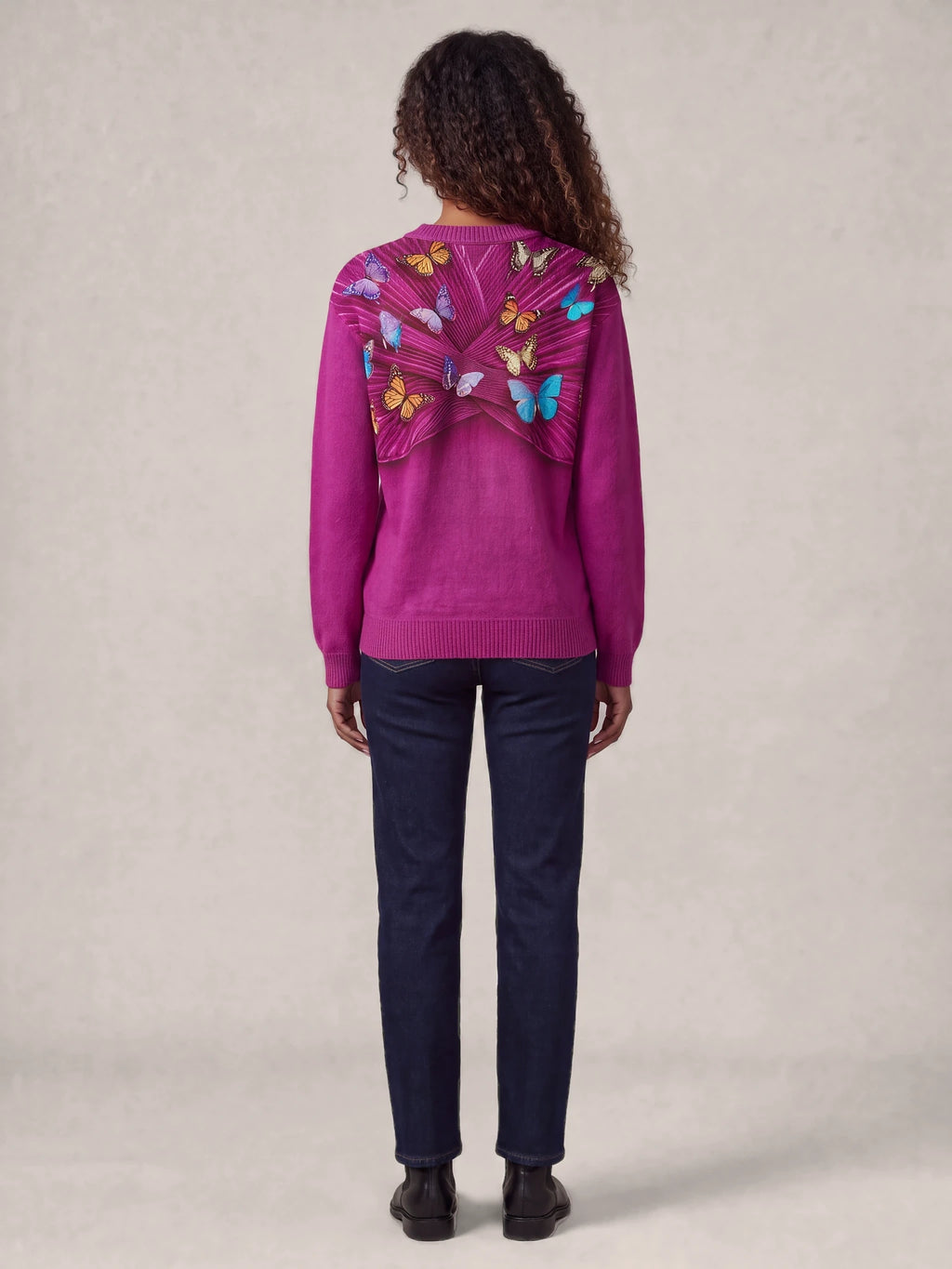 "Kipepeo" Sweatshirt — back view on model