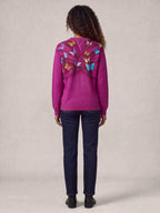"Kipepeo" Sweatshirt — back view on model
