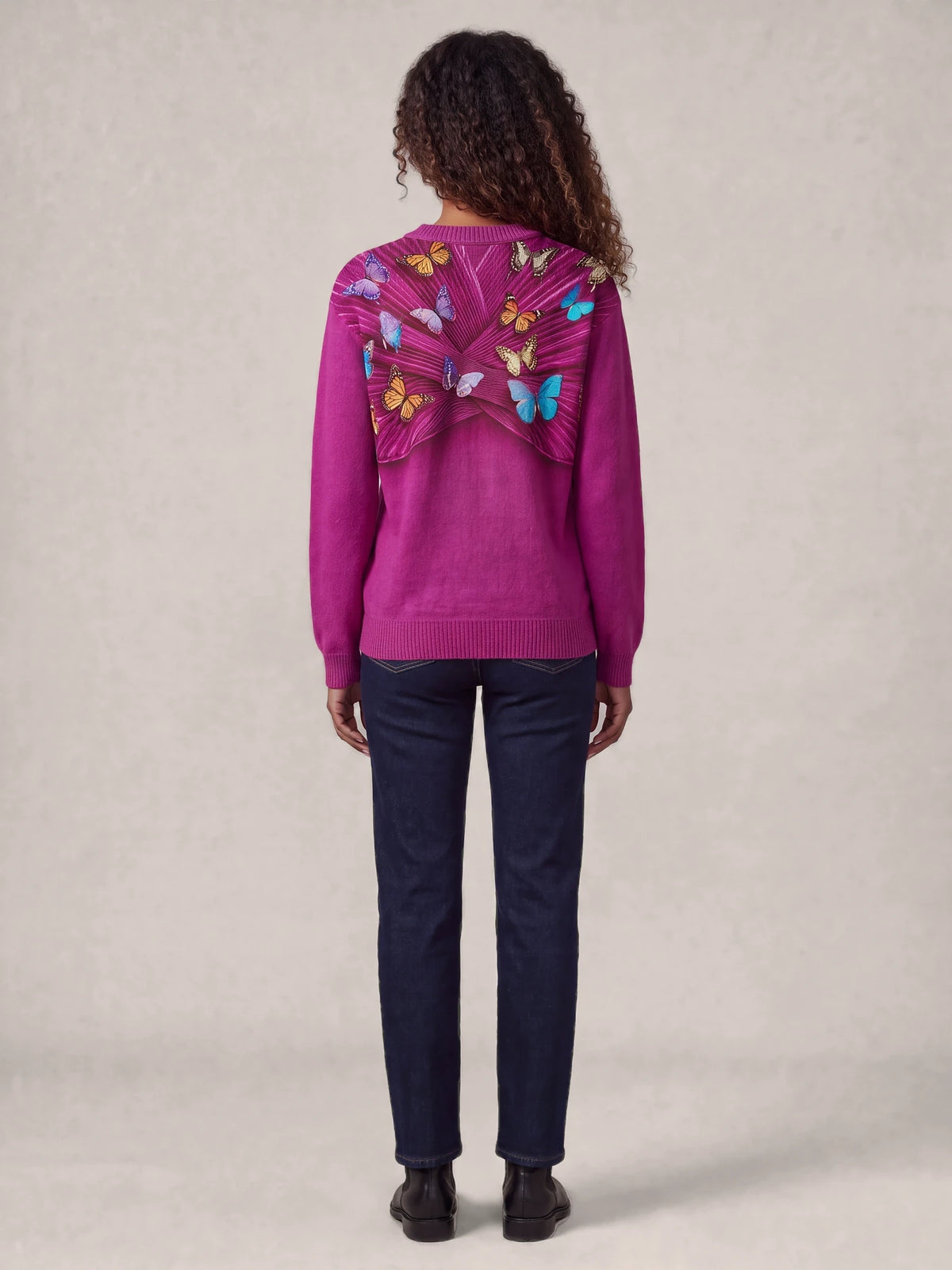 "Kipepeo" Sweatshirt — back view on model