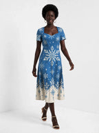 "Kipupwe" Sweetheart Midi Dress — front view on model
