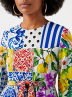"Kisiwa" Long Sleeve Midaxi Dress — close-up of the round neckline and long sleeve