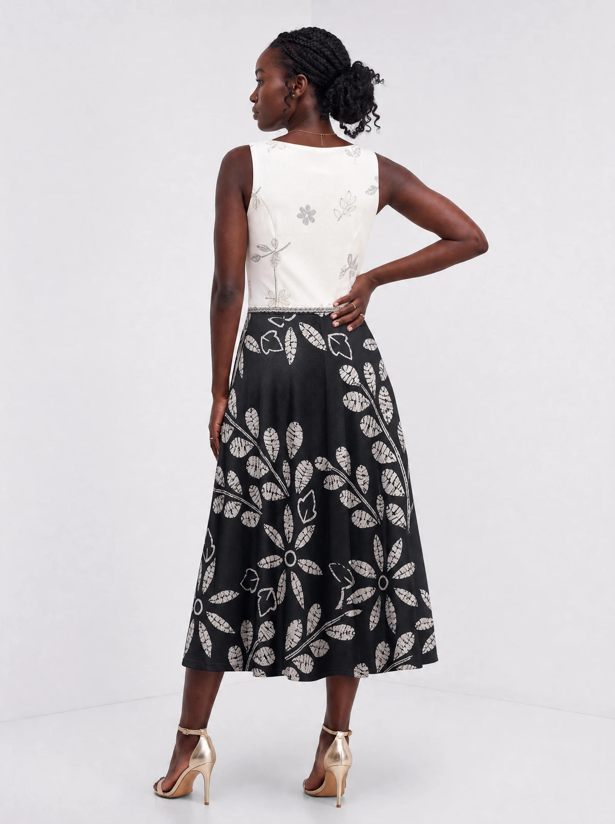 "Kivuli" Corset Dress — back view on model