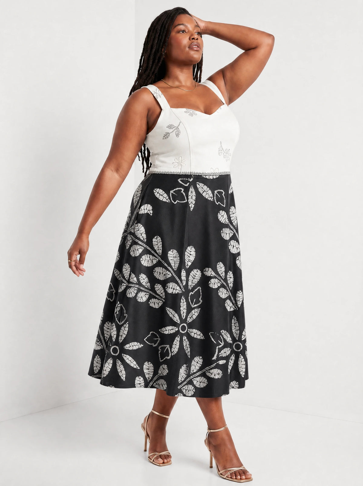 "Kivuli" Corset Dress — three-quarter view on model
