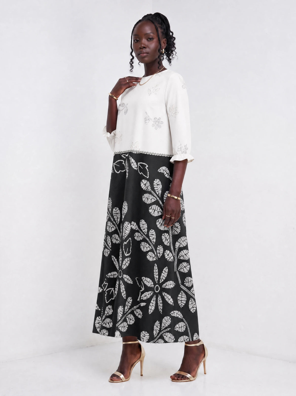 "Kivuli" Long Sleeve Maxi Dress — three-quarter view on model