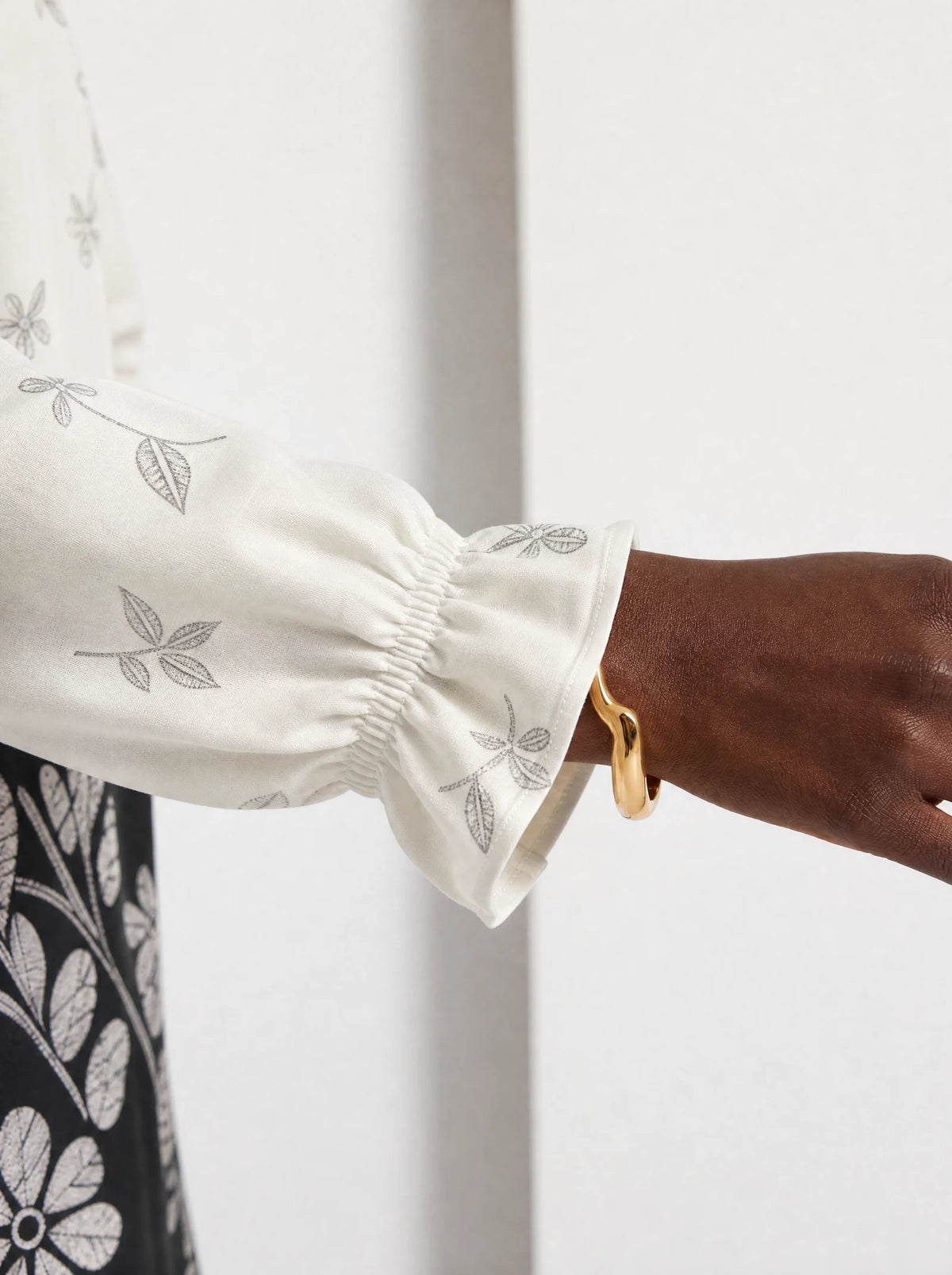 "Kivuli" Long Sleeve Maxi Dress — close-up of the gathered ruffle cuff at the wrist