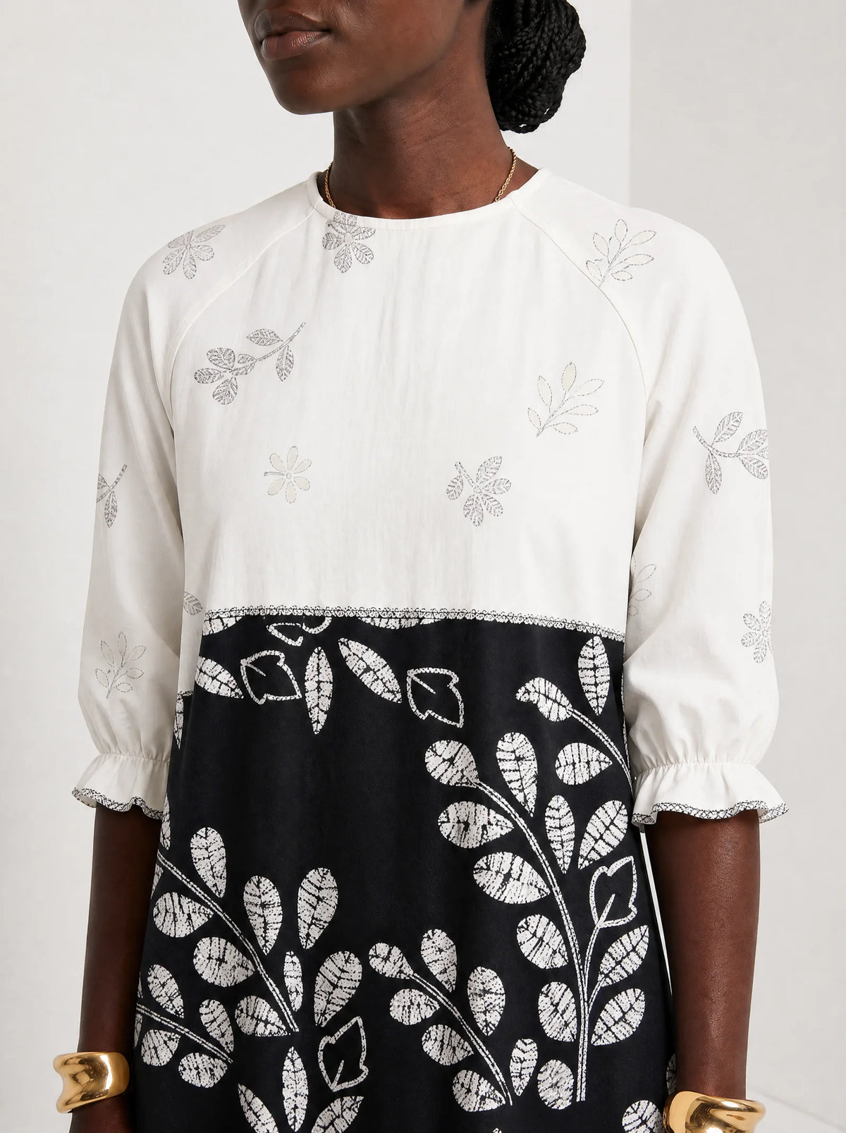 "Kivuli" Long Sleeve Maxi Dress — close-up of the high round neckline