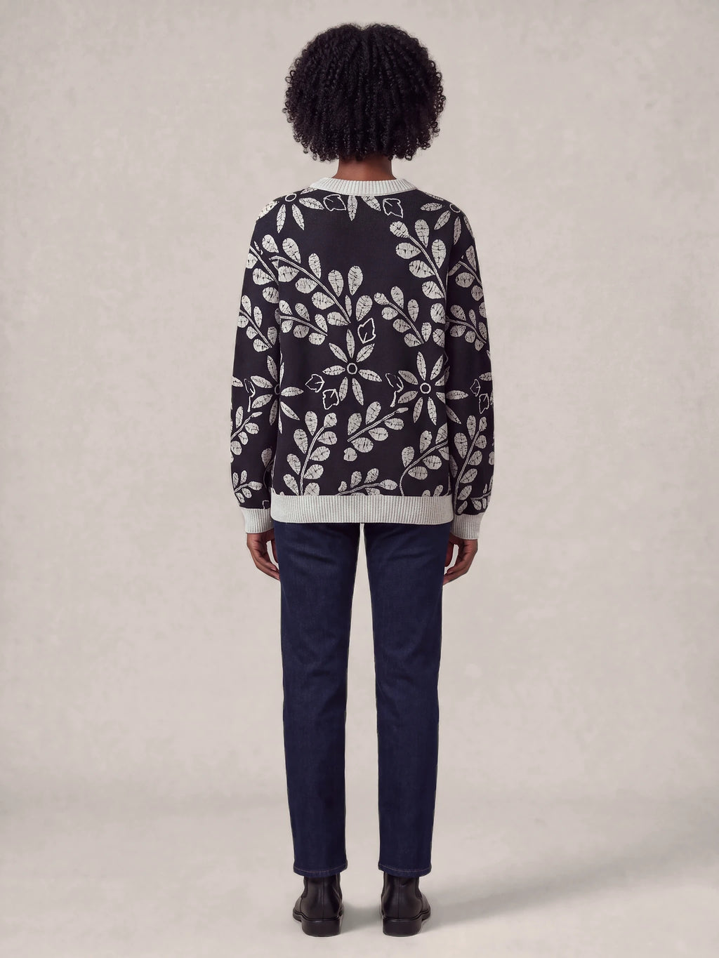 "Kivuli" Sweatshirt — back view on model