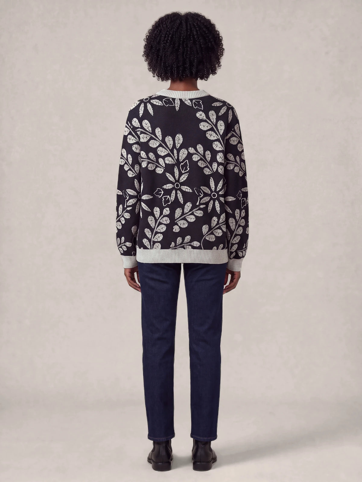 "Kivuli" Sweatshirt — back view on model