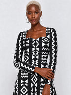 "Kuba" Long Sleeve Sweetheart Midi Dress — print close-up on model