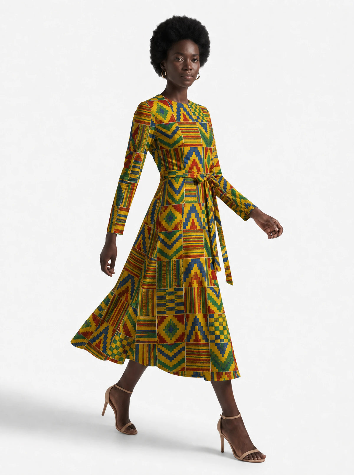 "Kumasi" Long Sleeve Midaxi Dress — three-quarter view on model, hand in the side pocket
