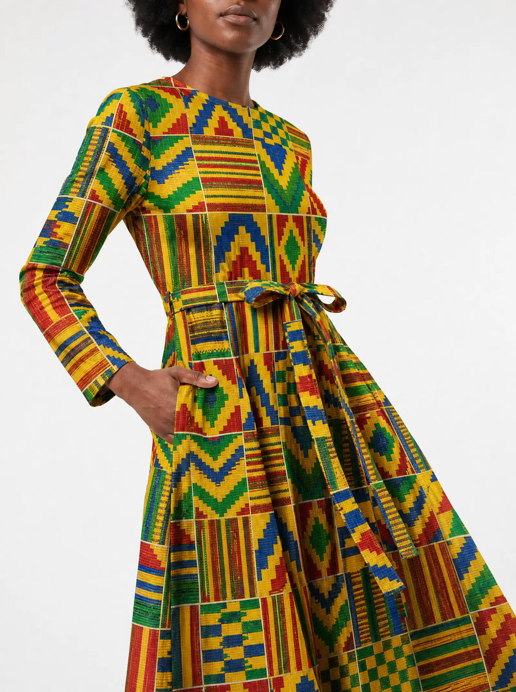 "Kumasi" Long Sleeve Midaxi Dress — close-up of the tie sash and the in-seam side pocket