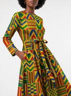 "Kumasi" Long Sleeve Midaxi Dress — close-up of the tie sash and the in-seam side pocket
