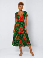 "Kuumba" Sweetheart Midi Dress — front view on model