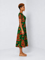 "Kuumba" Sweetheart Midi Dress — side view on model
