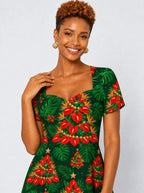 "Kuumba" Sweetheart Midi Dress — styled on model