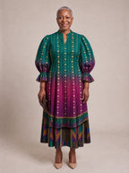 "Lulu" Puff Sleeve Dress — standing, angled view on model