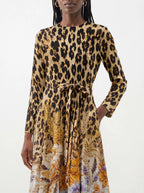 "Madoa" Long Sleeve Midaxi Dress — close-up of the tie sash and the in-seam side pocket