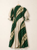 "Maile" Puff Sleeve Dress — the dress on a hanger, back
