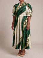 "Maile" Puff Sleeve Dress — three-quarter view on model