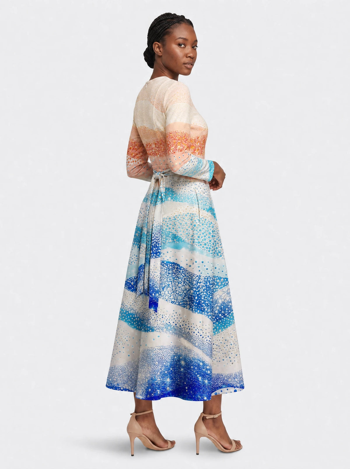 "Maji" Long Sleeve Midaxi Dress — three-quarter view on model, hand in the side pocket