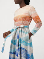 "Maji" Long Sleeve Midaxi Dress — close-up of the tie sash and the in-seam side pocket