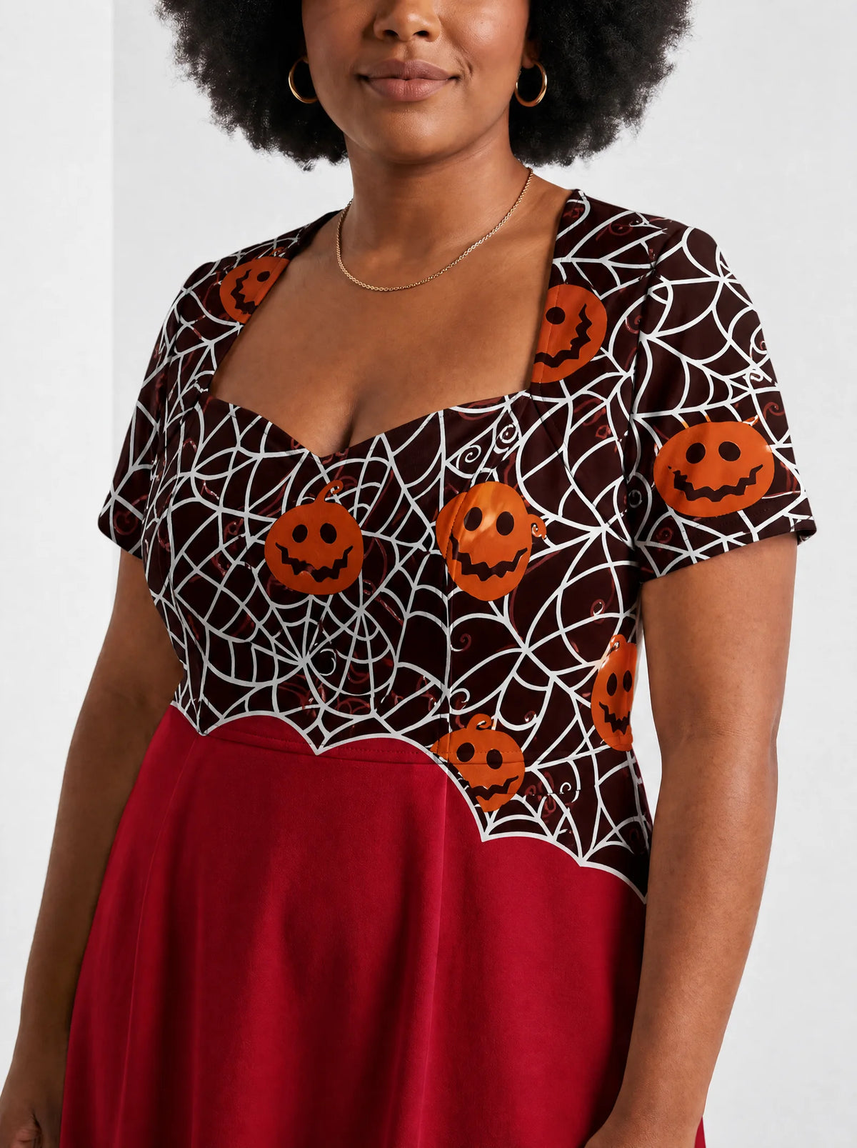 "Malenge" Halloween Sweetheart Midi Dress — close-up of the sweetheart neckline and short sleeve