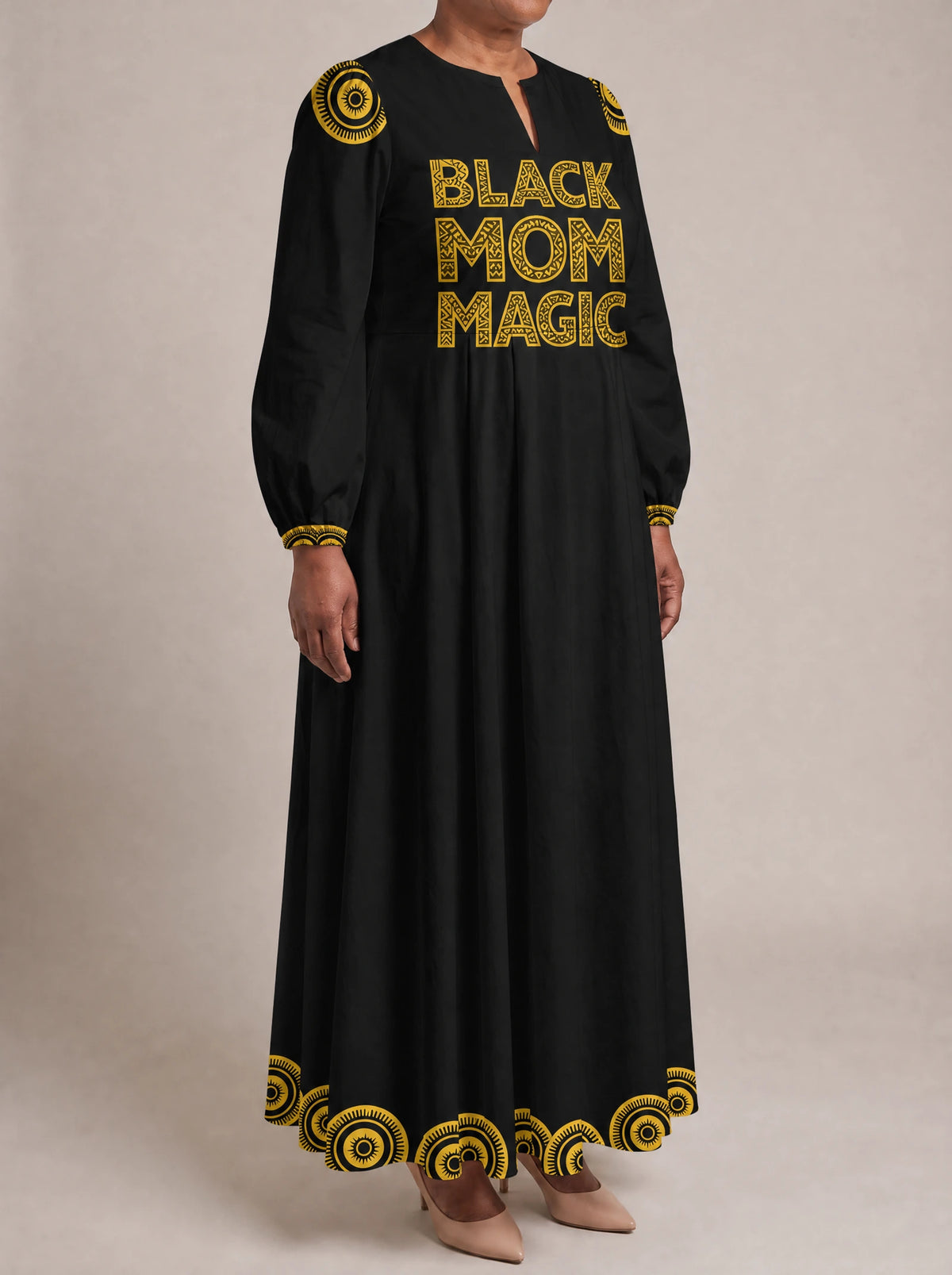 "Mamafo" Puff Sleeve Maxi Dress — three-quarter view on model
