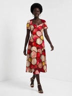 "Mapenzi" Sweetheart Midi Dress — front view on model