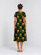 "Matawi" Sweetheart Midi Dress — back view on model