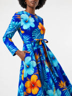 "Maua" Long Sleeve Midaxi Dress — close-up of the tie sash and the in-seam side pocket