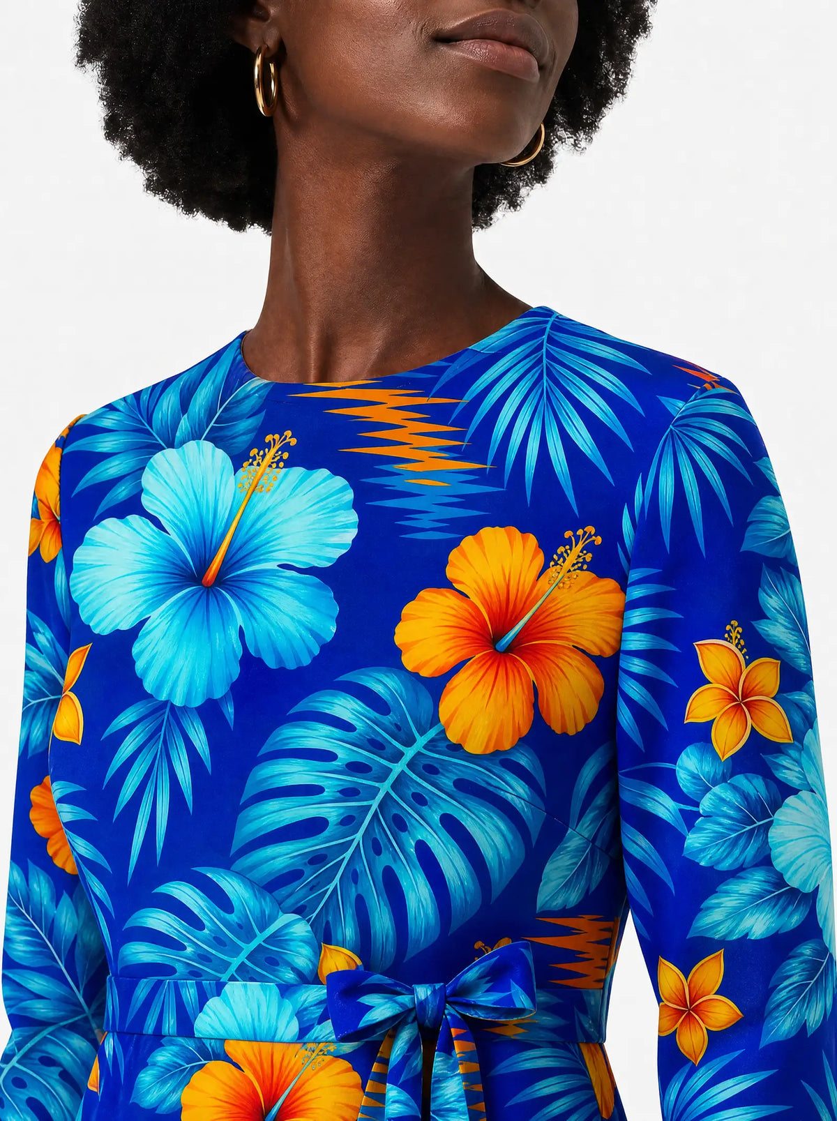 "Maua" Long Sleeve Midaxi Dress — close-up of the round neckline and long sleeve