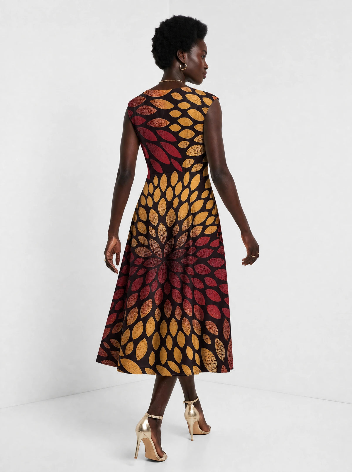 "Mavuno" Corset Dress — back view on model