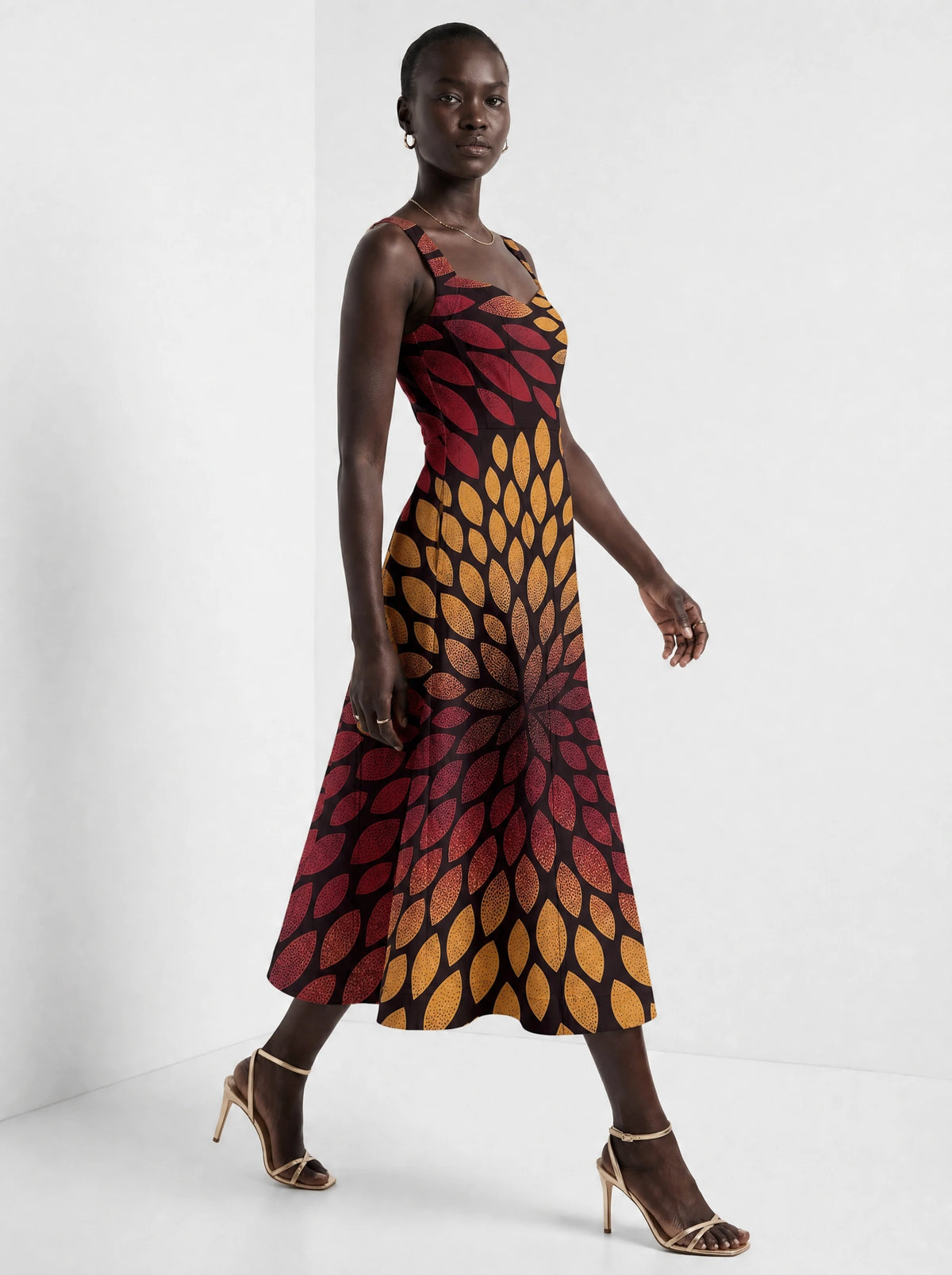 "Mavuno" Corset Dress — three-quarter view on model