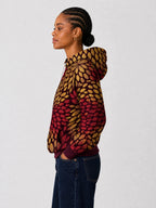 "Mavuno" Hoodie — side view on model