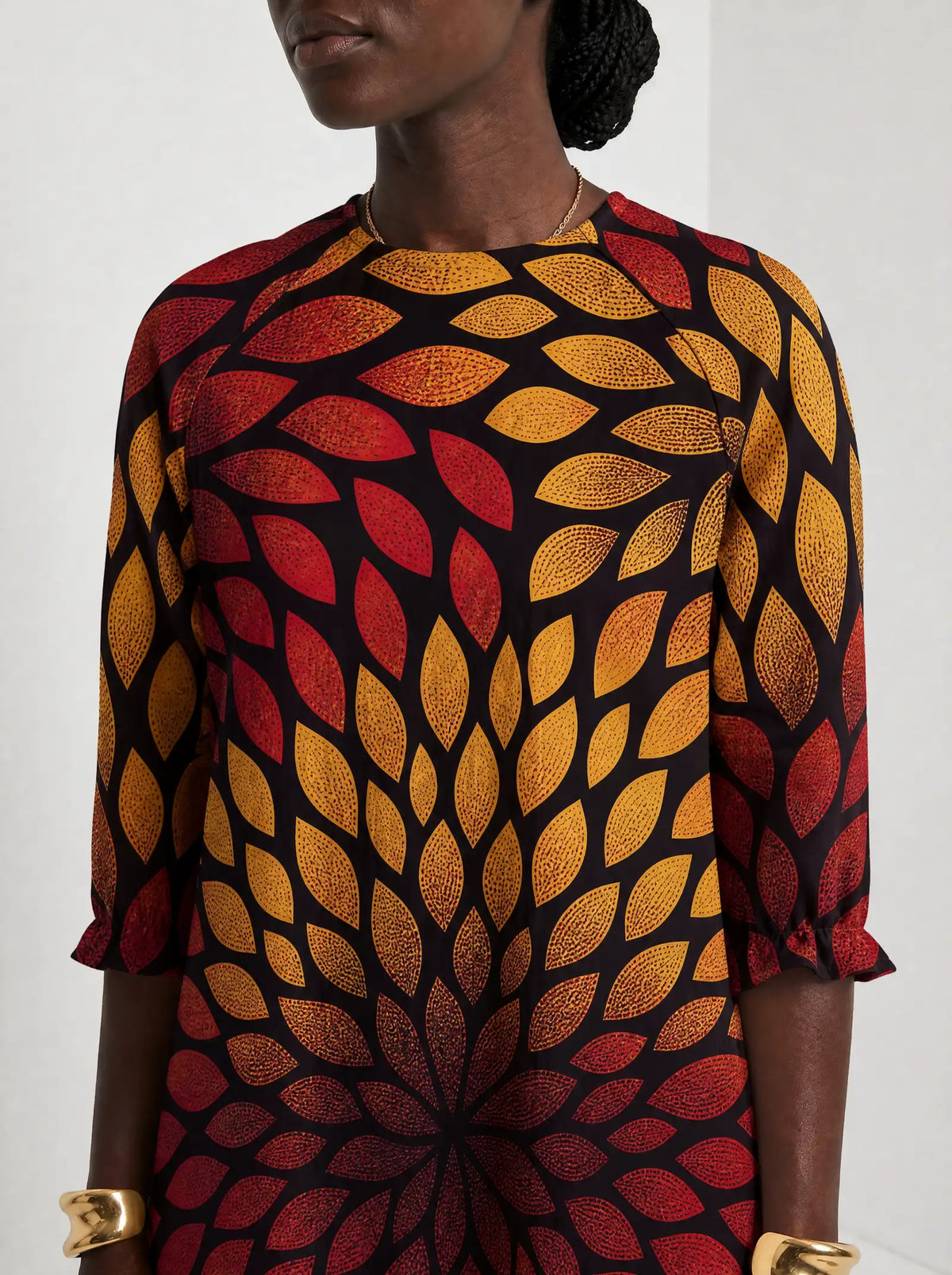 "Mavuno" Long Sleeve Maxi Dress — close-up of the high round neckline
