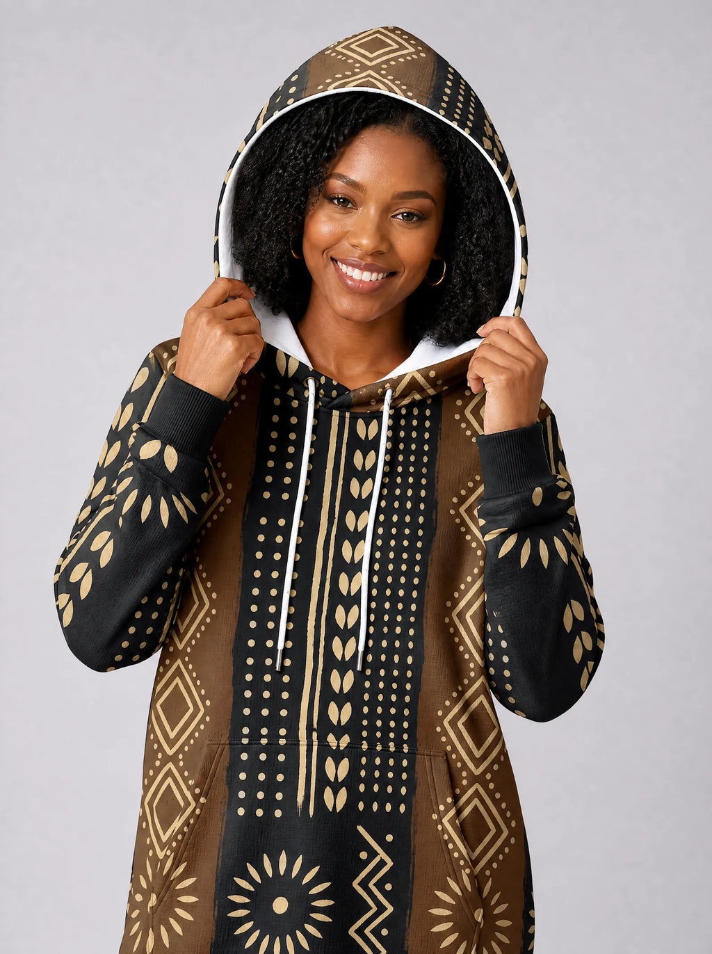 "Mbao" Hoodie Dress — close-up on model, hood up, styled with the matching leggings