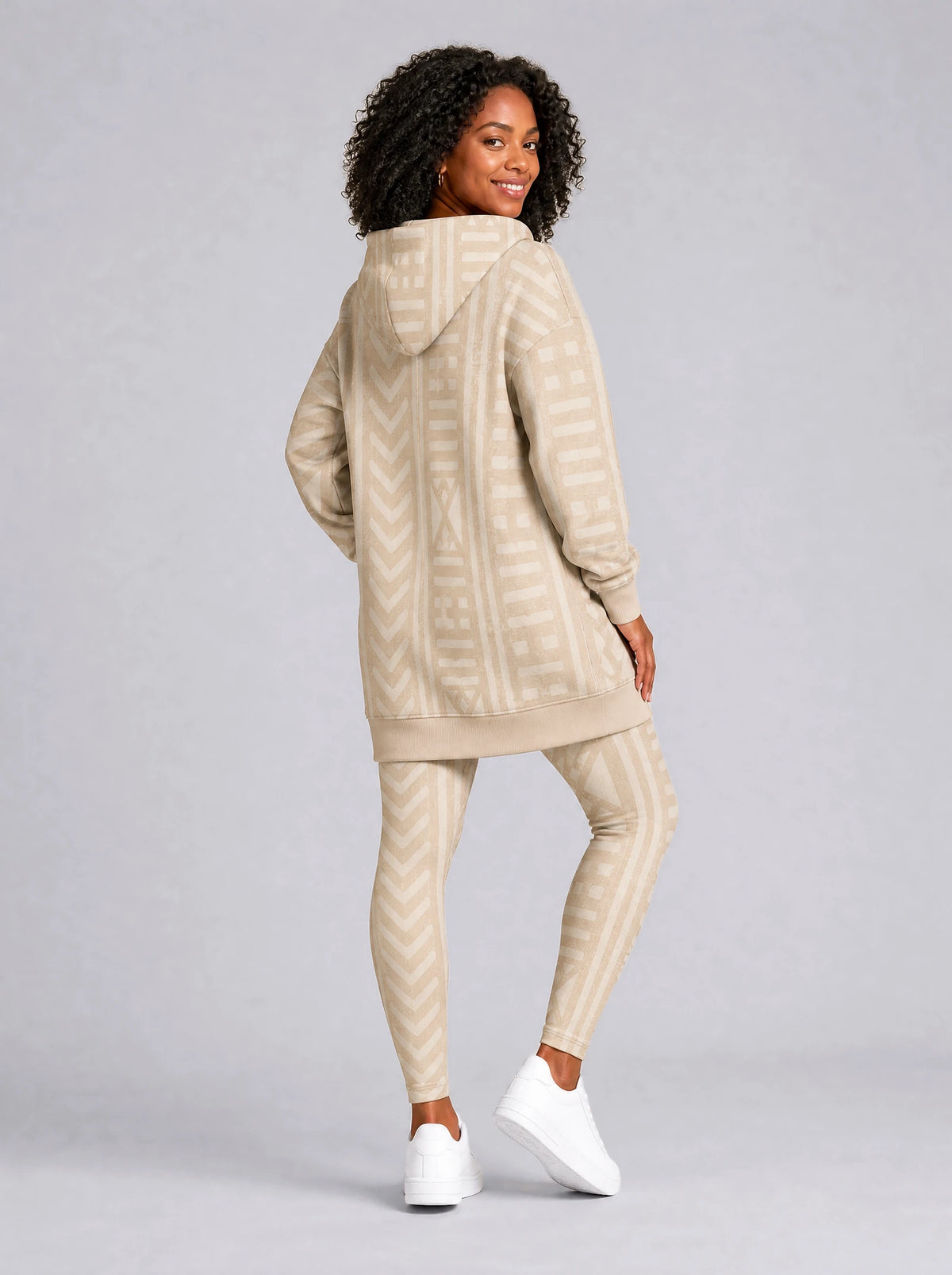 "Mchanga" Hoodie Dress — back view on model, styled with the matching leggings