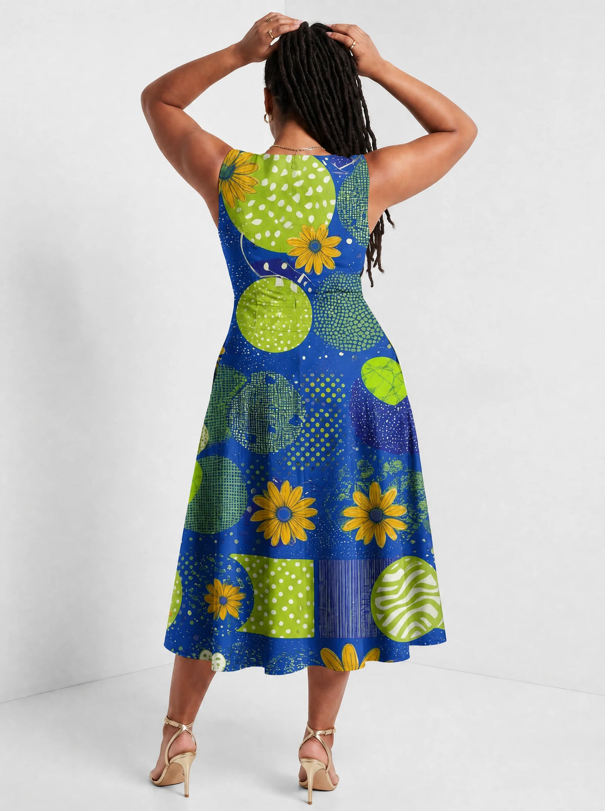 "Mchezo" Corset Dress — back view on model