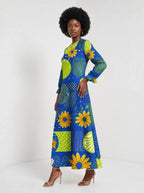 "Mchezo" Long Sleeve Maxi Dress — three-quarter view on model