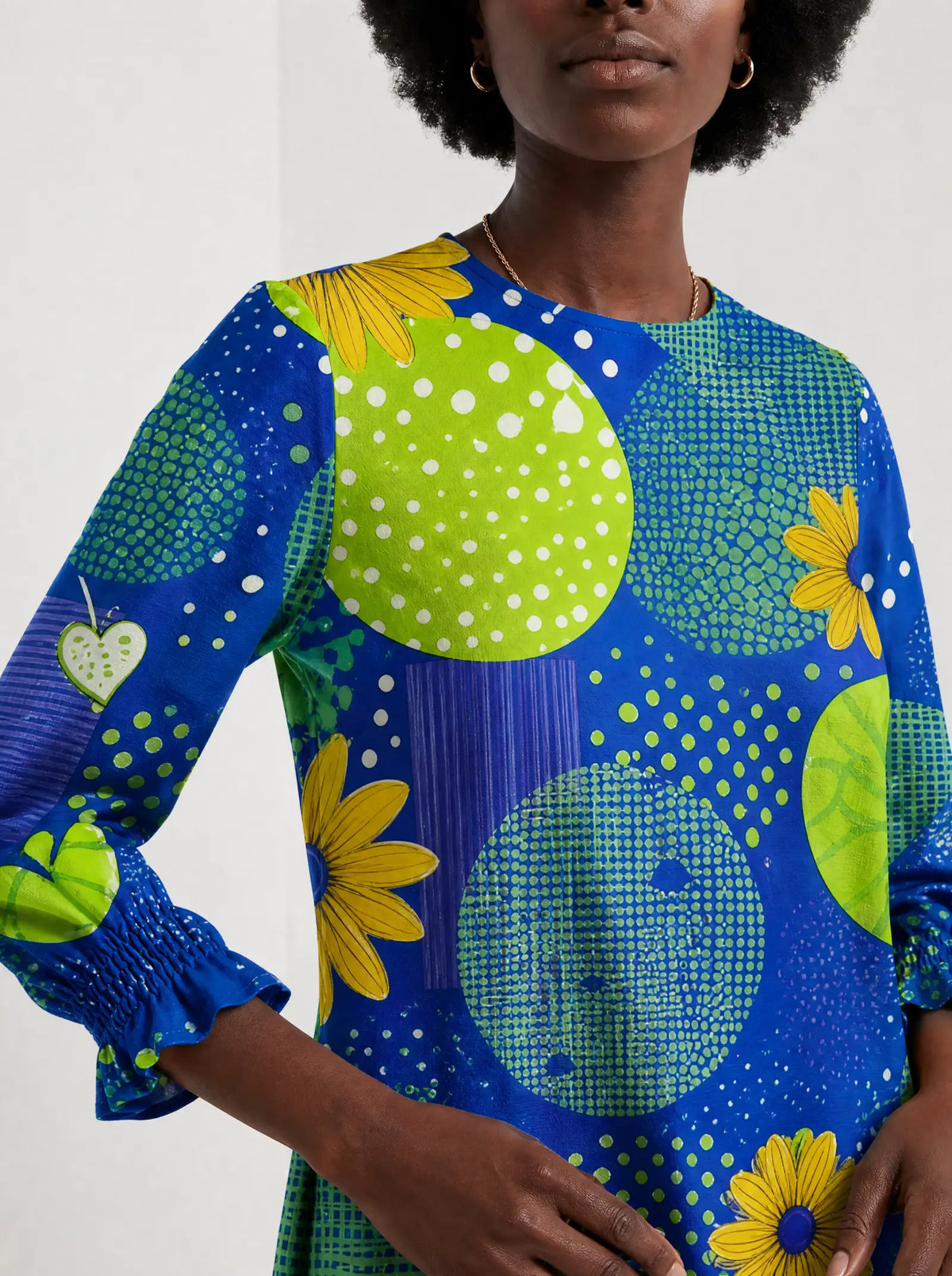 "Mchezo" Long Sleeve Maxi Dress — close-up of the high round neckline