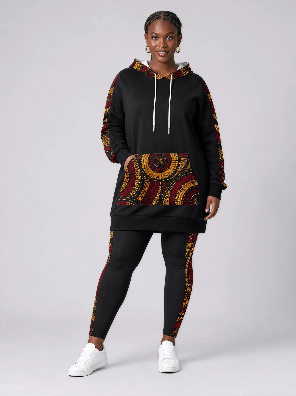 "Mduara" Hoodie Dress — front view on model, styled with the matching leggings