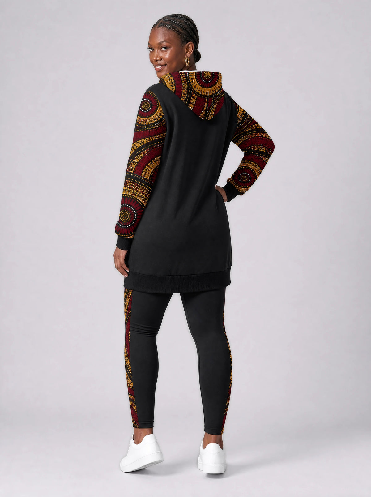 "Mduara" Leggings — back view on model, styled with the matching hoodie dress