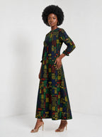 "Michoro" Long Sleeve Maxi Dress — three-quarter view on model